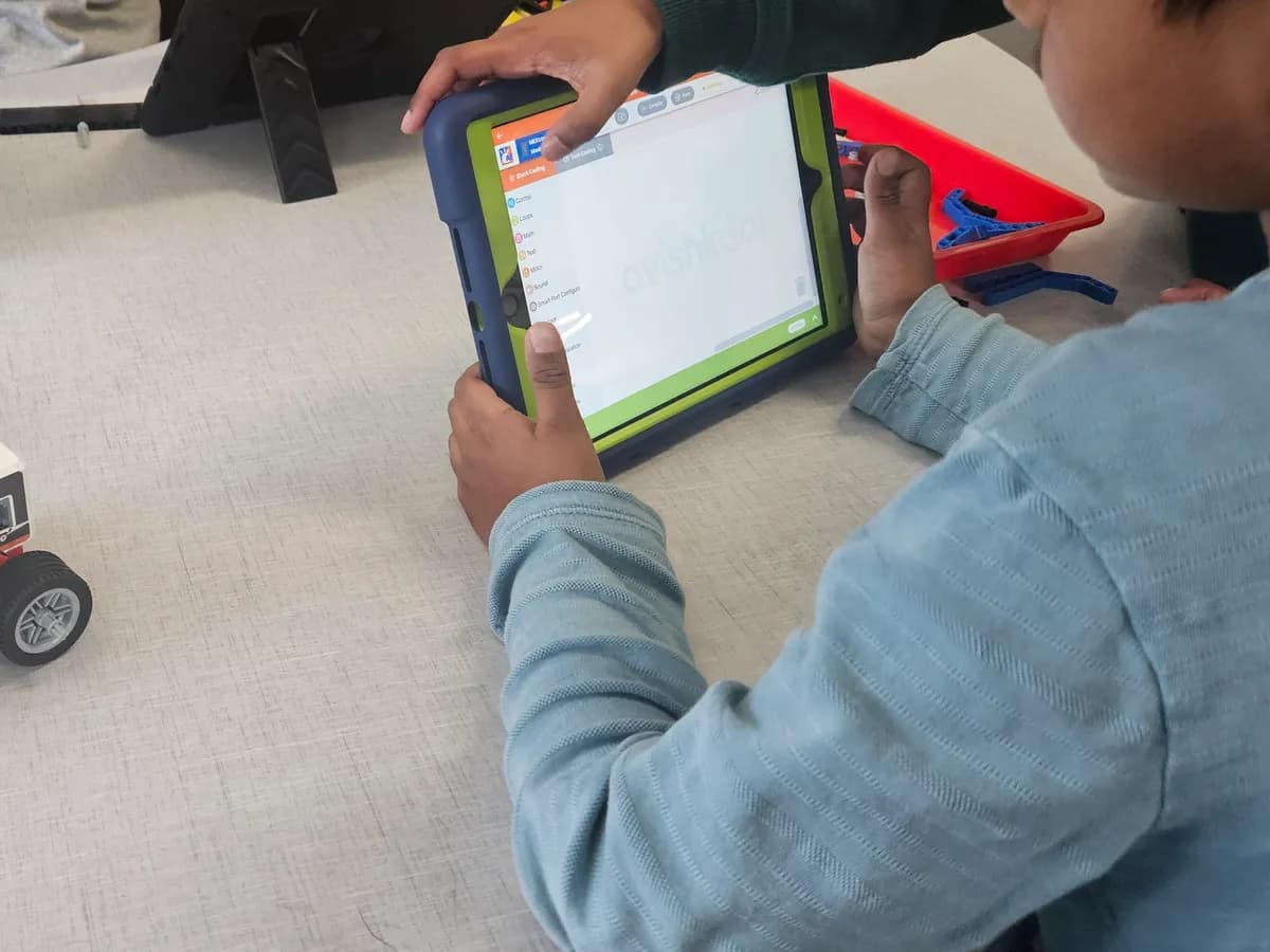 A student driving their robot from a tablet