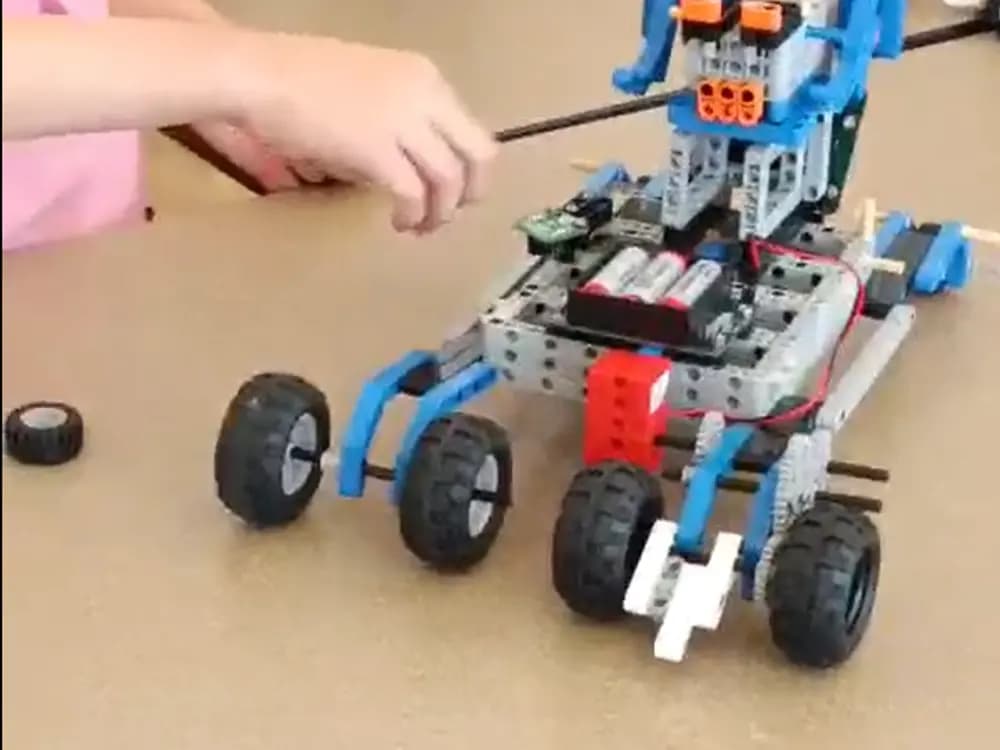 Robots built by after-school students on the Magnolia studio table
