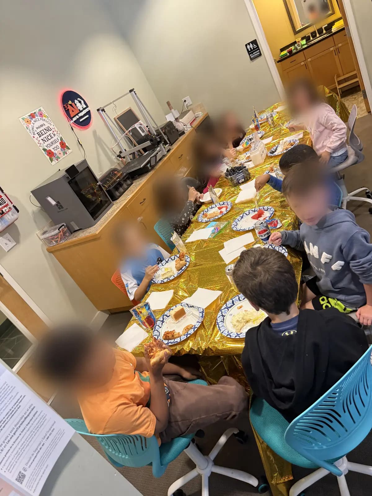 The whole party at the pizza table