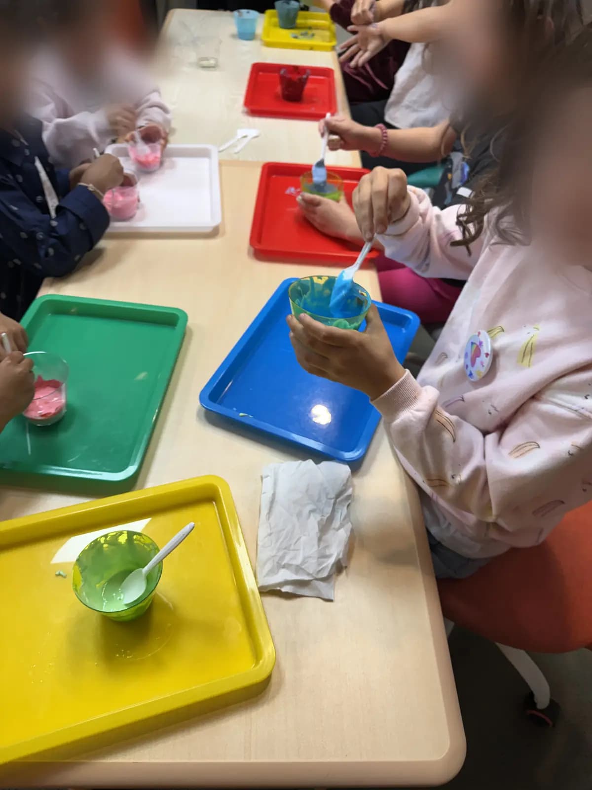 Mixing slime colors, one tray each